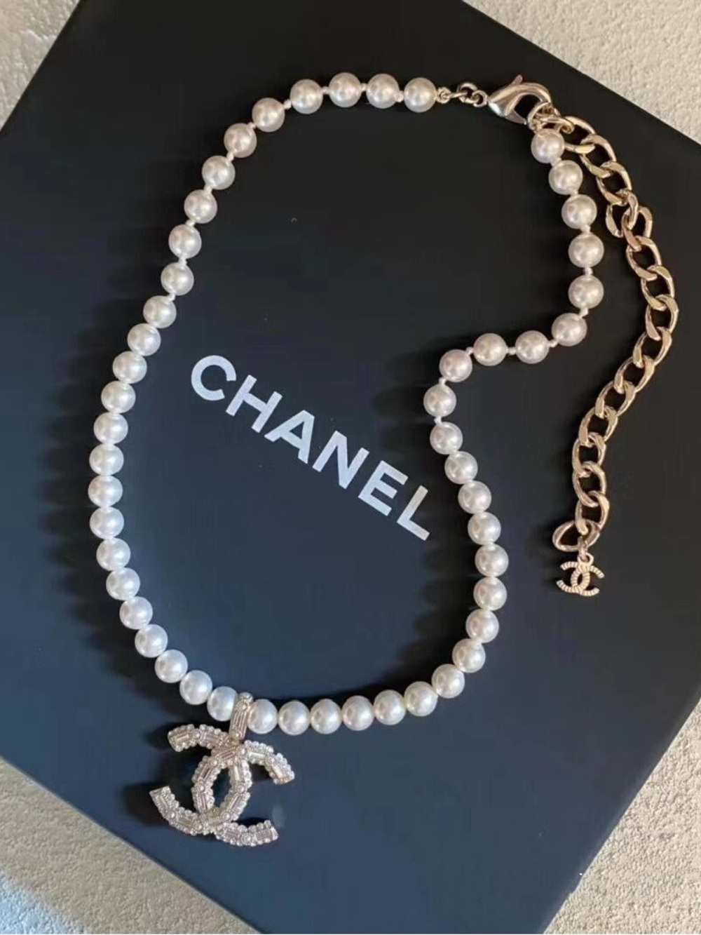 CHANEL Pearl Necklace with Gold Crystal CC Charm